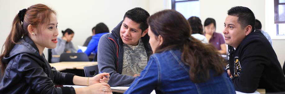 A group of students in the ESL classroom. 